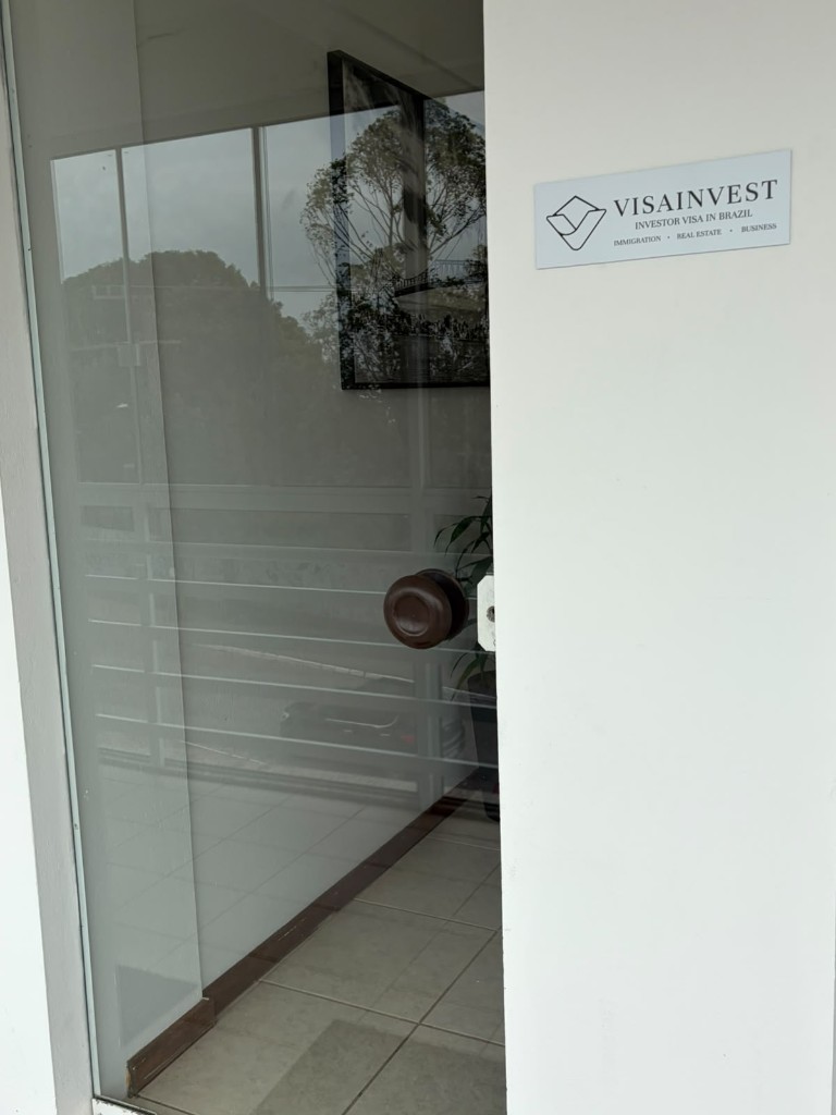 VisaInvest entrance and office plaque